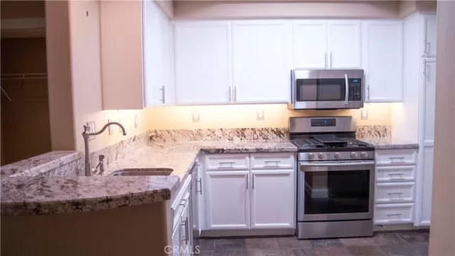 MLS: OC23008118 Condo For Sale