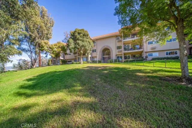 MLS: OC23010305 Condo For Sale