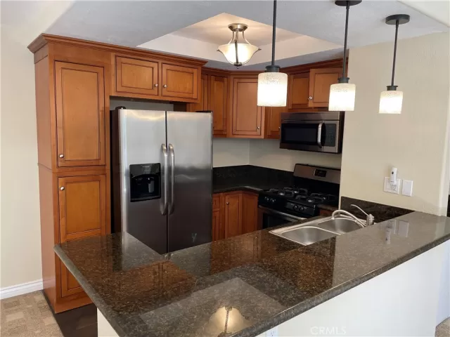 MLS: OC23031828 Condo For Sale