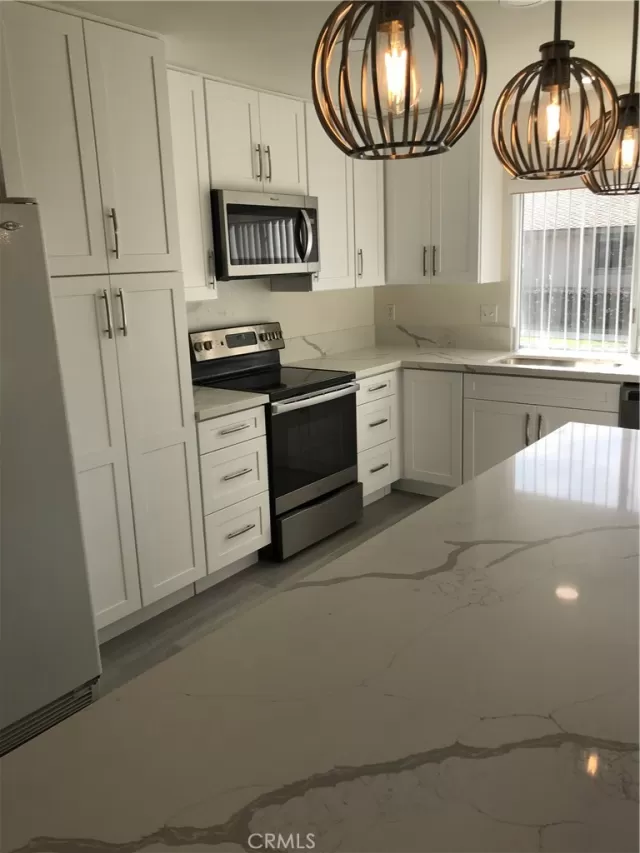 MLS: OC23055640 Condo For Sale