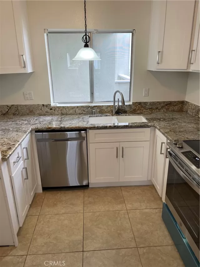 MLS: OC23059975 Condo For Sale