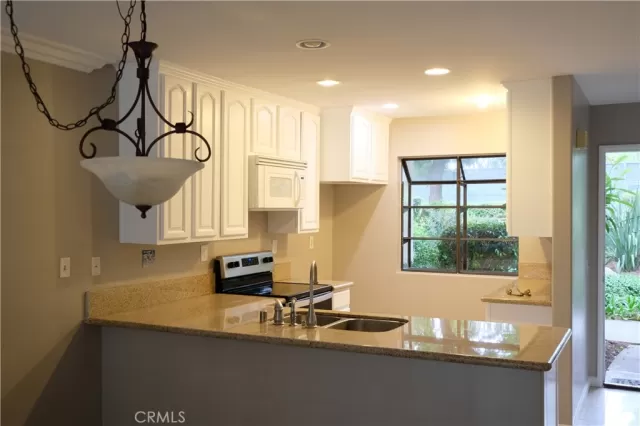 MLS: OC23101812 Condo For Sale