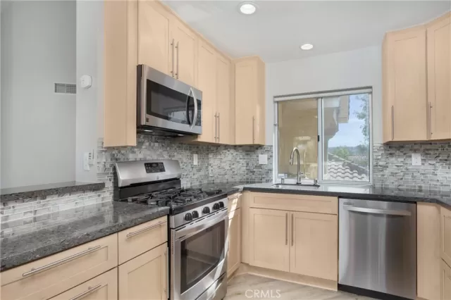 MLS: OC23113337 Condo For Sale
