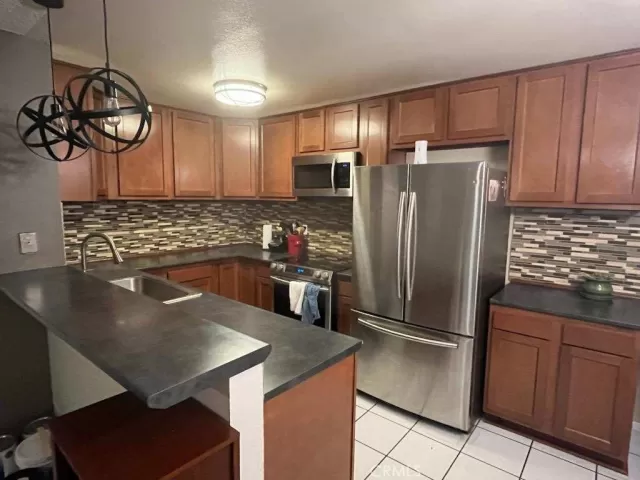 MLS: OC23122051 Condo For Sale