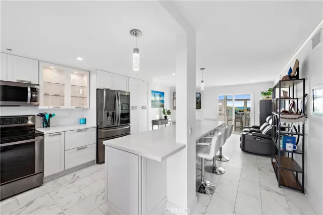 MLS: OC23205475 Condo For Sale