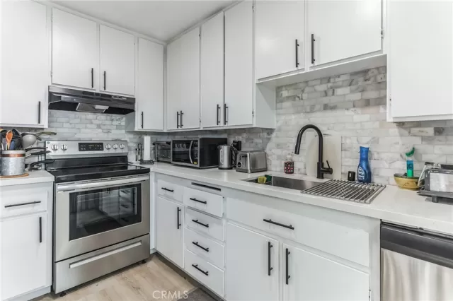 MLS: OC24007459 Condo For Sale