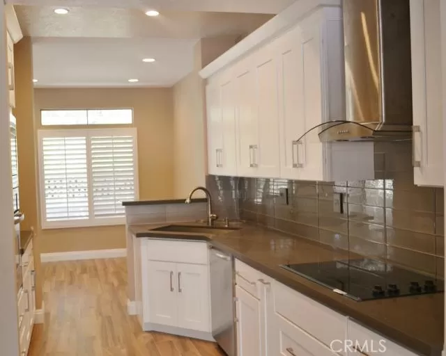 MLS: OC24014371 Condo For Sale