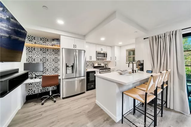 MLS: OC24014947 Condo For Sale