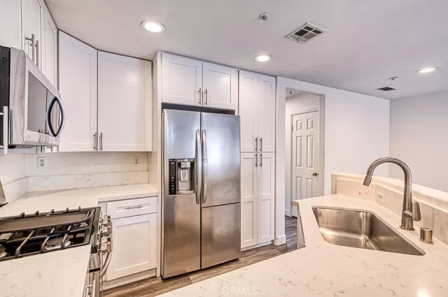 MLS: OC24015025 Condo For Sale