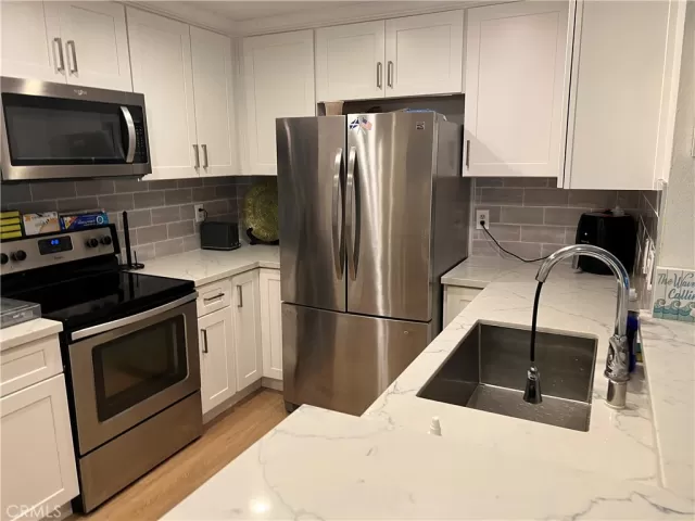 MLS: OC24023500 Condo For Sale