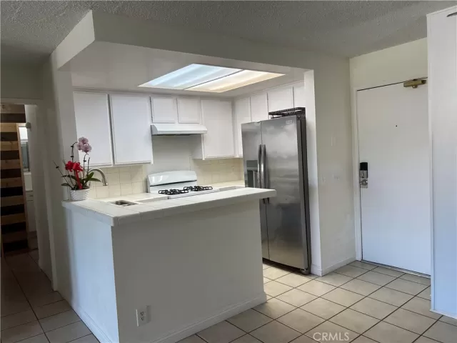 MLS: OC24032313 Condo For Sale