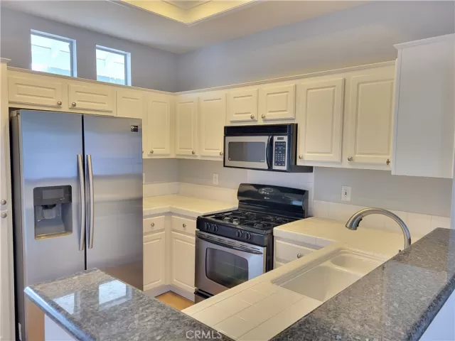 MLS: OC24040357 Condo For Sale