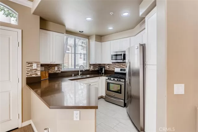 MLS: OC24040545 Condo For Sale