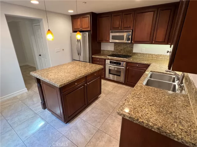 MLS: OC24055750 Condo For Sale