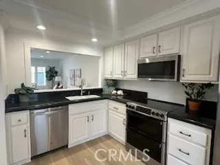 MLS: OC24084099 Condo For Sale