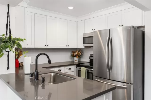 MLS: OC24103380 Condo For Sale