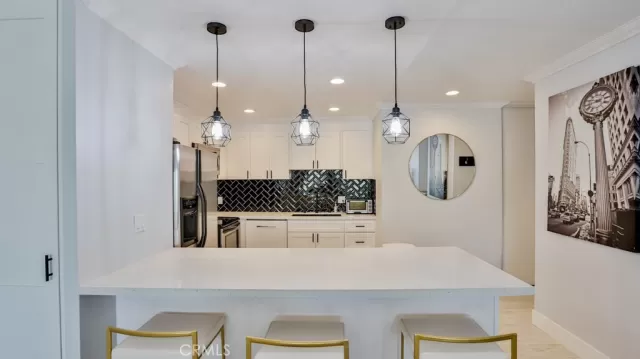 MLS: OC24104313 Condo For Sale