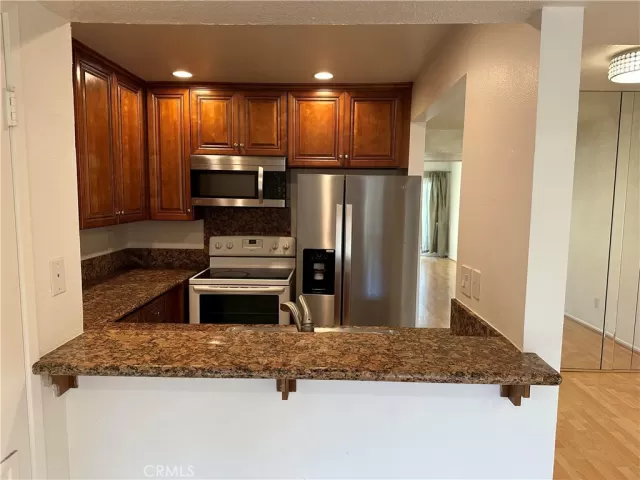 MLS: OC24110600 Condo For Sale