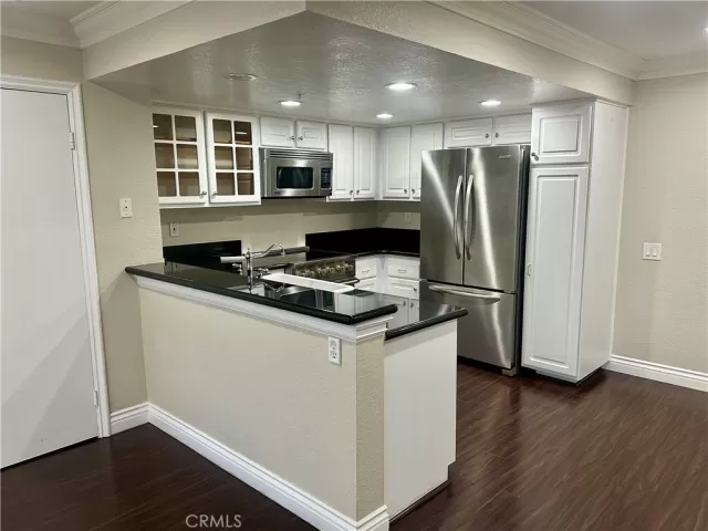 MLS: OC24113310 Condo For Sale