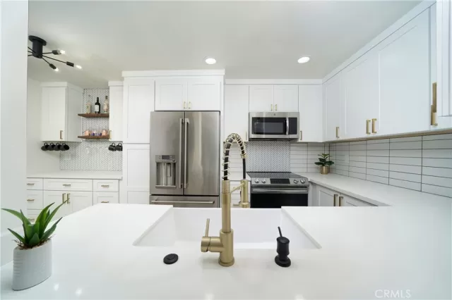 MLS: OC24116200 Condo For Sale