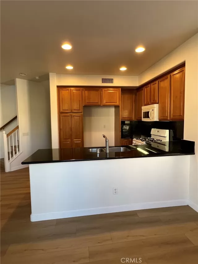 MLS: OC24117610 Condo For Sale