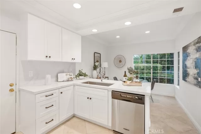 MLS: OC24119335 Condo For Sale