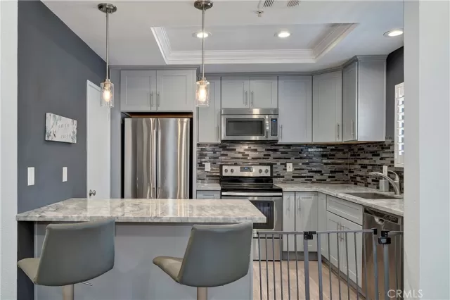 MLS: OC24126450 Condo For Sale