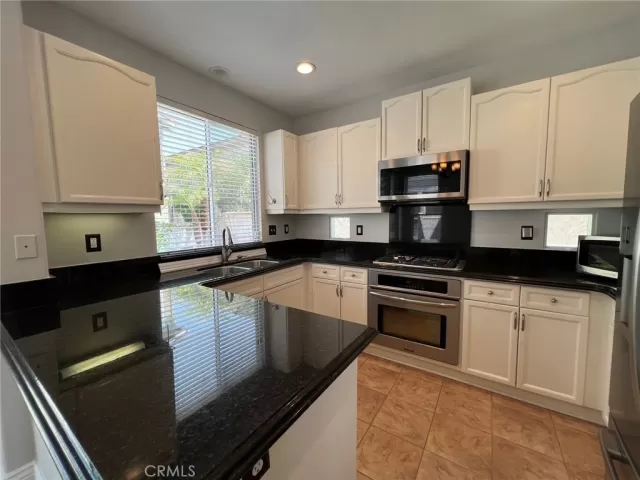 MLS: OC24135512 Condo For Sale