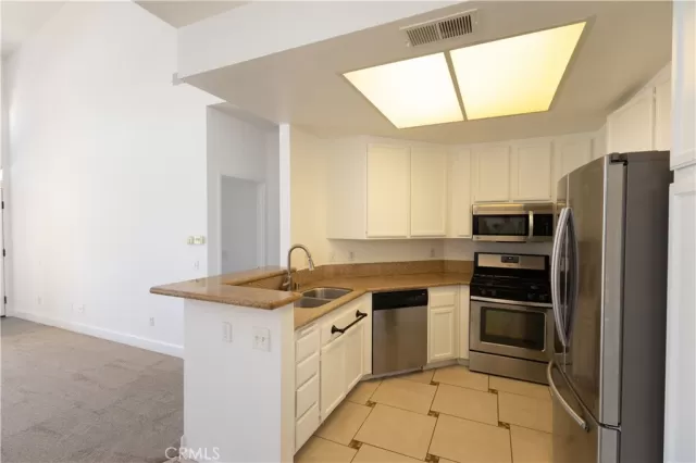 MLS: OC24156622 Condo For Sale
