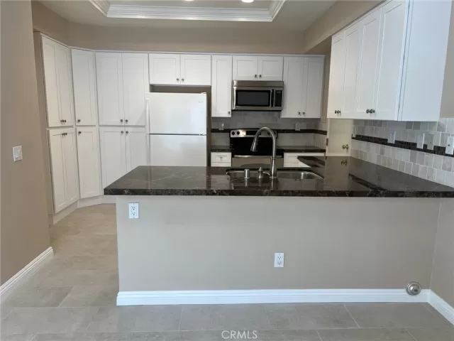 MLS: OC24161310 Condo For Sale