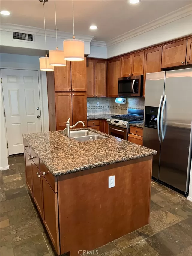 MLS: OC24162812 Condo For Sale