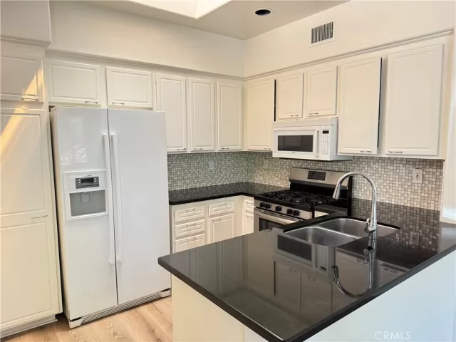 MLS: OC24170271 Condo For Sale