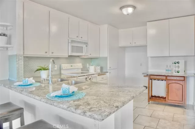 MLS: OC24209010 Condo For Sale