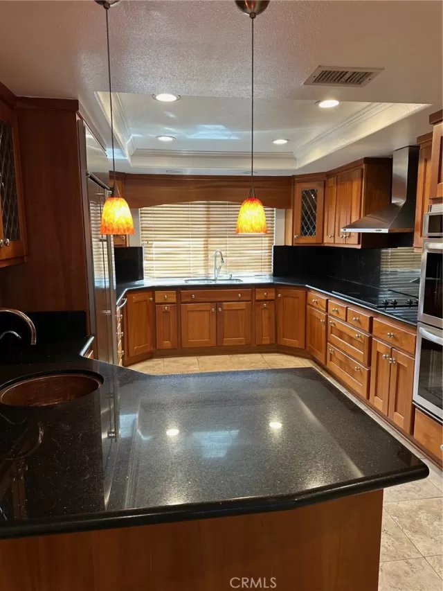 MLS: OC24218231 Condo For Sale