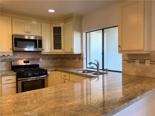 MLS: OC24244830 Condo For Sale
