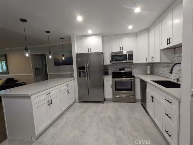 MLS: OC25007343 Condo For Sale