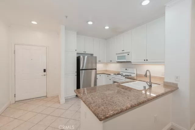 MLS: OC25007521 Condo For Sale
