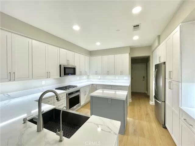MLS: OC25007919 Condo For Sale