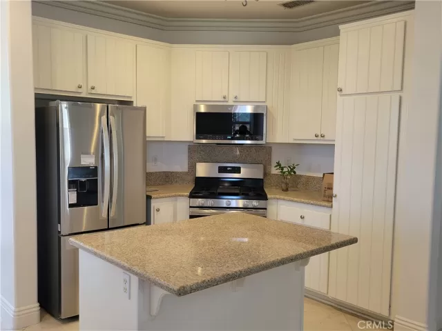 MLS: OC25008425 Condo For Sale
