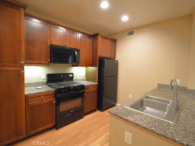 MLS: OC25008493 Condo For Sale