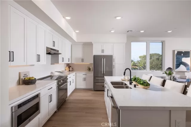 MLS: OC25009512 Condo For Sale