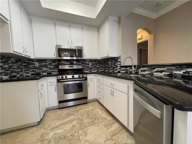 MLS: OC25010094 Condo For Sale