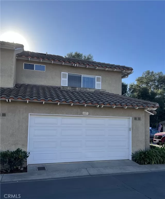 MLS: OC25010395 Condo For Sale