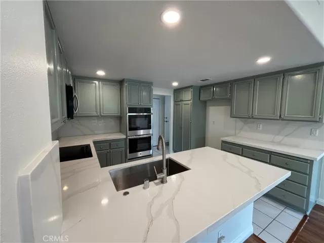 MLS: OC25022484 Condo For Sale