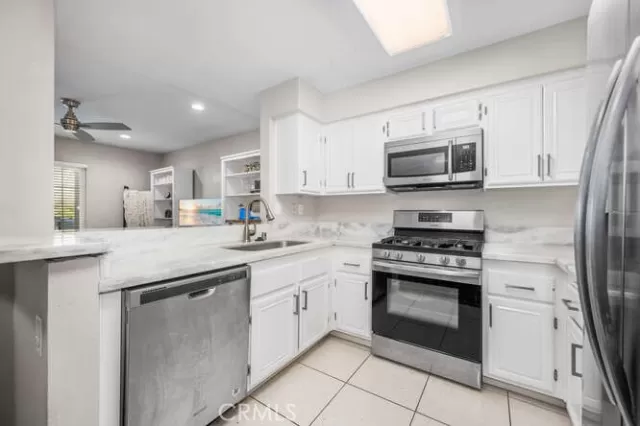 MLS: OC25026911 Condo For Sale