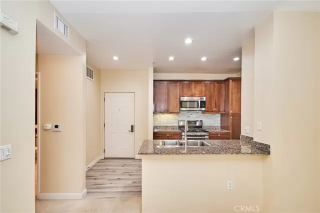 MLS: OC25028177 Condo For Sale
