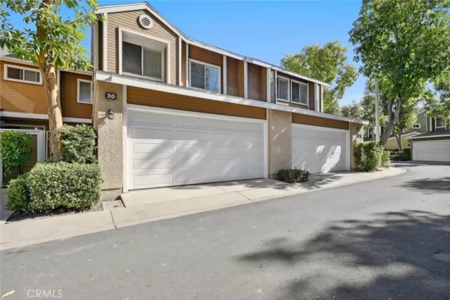 MLS: OC25031395 Condo For Sale