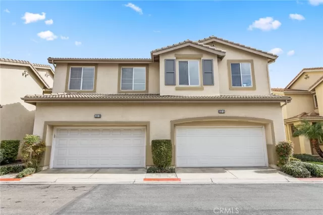 MLS: OC25032355 Condo For Sale