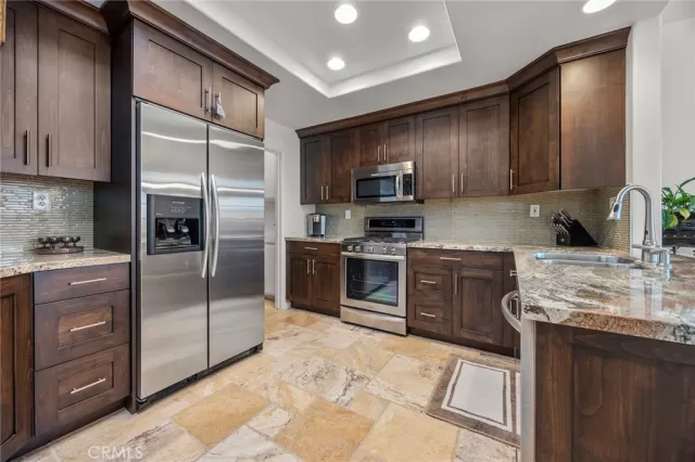 MLS: OC25033166 Condo For Sale