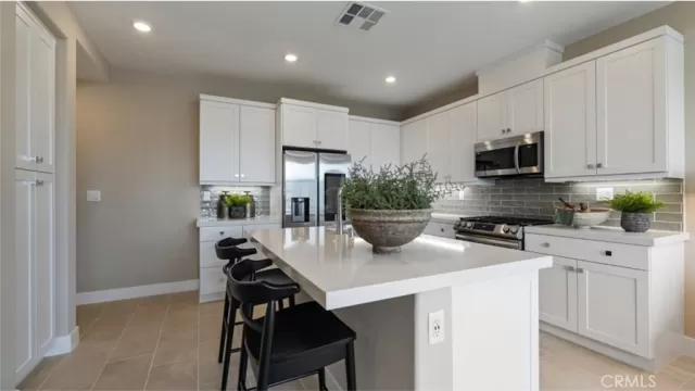 MLS: OC25036887 Condo For Sale